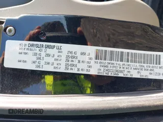 2013 Dodge Grand Caravan SXT with VIN 2C4RDGCG1DR626827, listed as a IAAI auction lot 38984754 with 224,487 mi miles and . Bid and sale history available at DreamBid. Image 9.