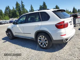 2012 BMW X5 35i with VIN 5UXZV4C5XCL987618, listed as a Copart auction lot 60308965 with 98,195 mi miles and Salvage title. Bid and sale history available at DreamBid. Image 2.
