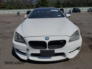 2015 BMW M6 z VIN WBS6C9C5XFD467711, wystawiony jako Copart lot #66574644 z przebiegiem 101 001 mil mil oraz Szkody całkowita. Historia ofert i sprzedaży dostępna na DreamBid. Obrazek 5.