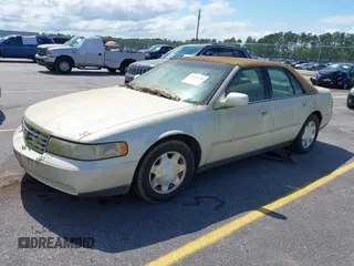 2001 Cadillac Seville Luxury SLS z VIN 1G6KS54Y81U110047, wystawiony jako IAAI lot #42436746 z przebiegiem 107 360 mil mil oraz . Historia ofert i sprzedaży dostępna na DreamBid. Obrazek 2.