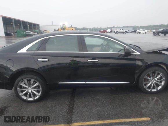 2013 Cadillac XTS Premium z VIN 2G61S5S39D9112491, wystawiony jako IAAI lot #42216373 z przebiegiem 145 338 mil mil oraz . Historia ofert i sprzedaży dostępna na DreamBid. Obrazek 13.