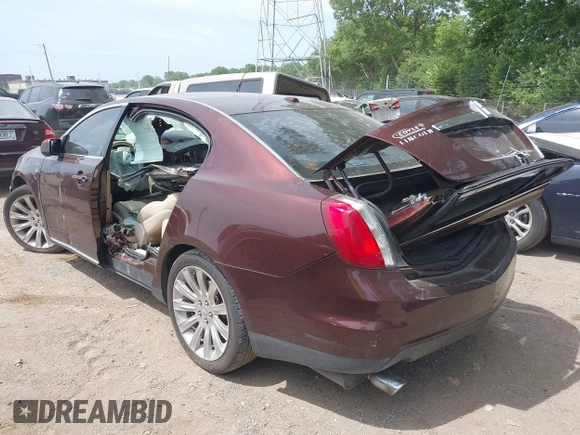 2012 Lincoln MKS with VIN 1LNHL9DRXCG802389, listed as a IAAI auction lot 39543911 with 97,957 mi miles. Bid and sale history available at carsss.com. Image 3.