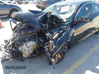 2019 Honda Civic Sport with VIN 19XFC2F89KE051016, listed as a IAAI auction lot 42042322 with 36,775 mi miles and . Bid and sale history available at DreamBid. Image 6.