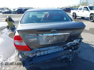 2004 Toyota Camry LE with VIN 4T1BF30K94U577260, listed as a IAAI auction lot 41906287 with 68,499 mi miles. Bid and sale history available at carsss.com. Image 6.