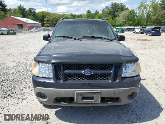 2001 Ford Explorer Sport Trac z VIN 1FMZU77E61UB01605, wystawiony jako Copart lot #56976175 z przebiegiem 106 313 mil mil oraz Czysty tytuł • Clean title. Historia ofert i sprzedaży dostępna na DreamBid. Obrazek 5.