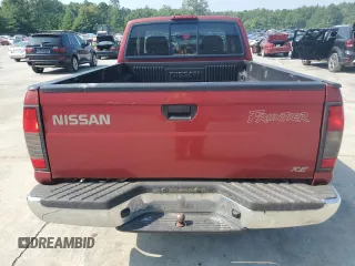 2000 Nissan Frontier XE with VIN 1N6DD26SXYC393054, listed as a Copart auction lot 62410125 with 106,319 mi miles and Salvage title. Bid and sale history available at DreamBid. Image 6.