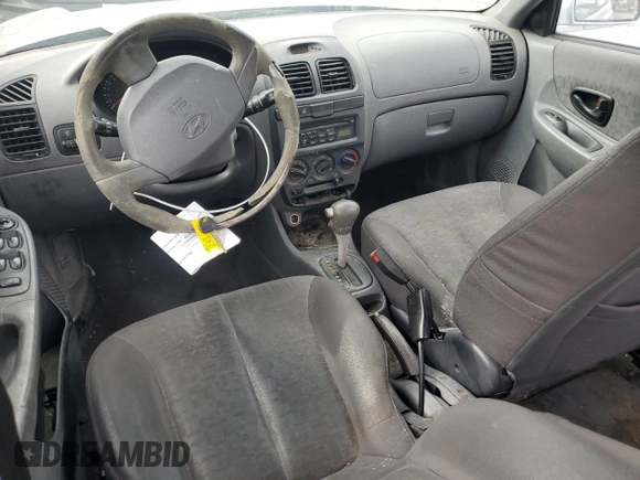 2004 Hyundai Accent GL with VIN KMHCG45C34U567915, listed as a Copart auction lot 43654985 with 141,461 mi miles and Clean Title. Bid and sale history available at carsss.com. Image 8.