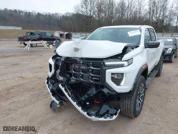 2024 GMC Canyon 4WD AT4 with VIN 1GTP6DEK1R1230068, listed as a IAAI auction lot 41491052 with 2,058 mi miles. Bid and sale history available at carsss.com. Image 6.