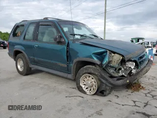 1998 Ford Explorer Sport with VIN 1FMYU22X7WUB73136, listed as a Copart auction lot 54338255 with 197,323 mi miles and Salvage title. Bid and sale history available at DreamBid. Image 4.