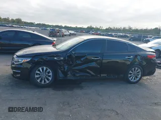 2018 Kia Optima LX with VIN 5XXGT4L38JG256924, listed as a IAAI auction lot 41267413 with 129,820 mi miles and . Bid and sale history available at DreamBid. Image 14.
