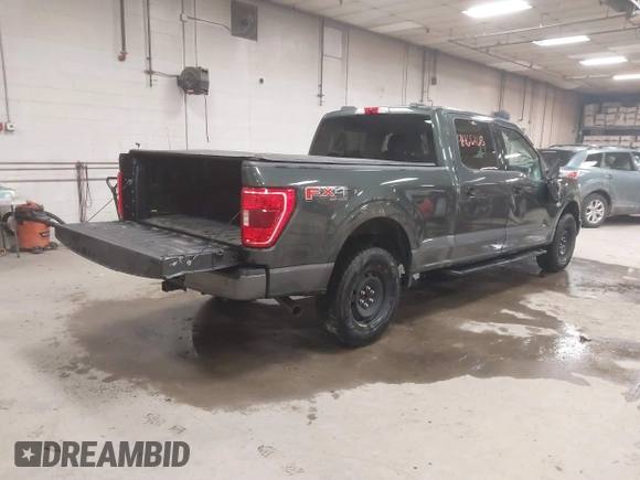 2021 Ford F-150 XL with VIN 1FTFW1E59MKD82204, listed as a IAAI auction lot 41466186 with 56,839 mi miles. Bid and sale history available at carsss.com. Image 4.