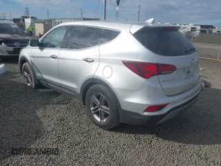 2017 Hyundai Santa Fe 2.4L with VIN 5XYZTDLB7HG444081, listed as a IAAI auction lot 42207558 with 119,054 mi miles and . Bid and sale history available at DreamBid. Image 3.