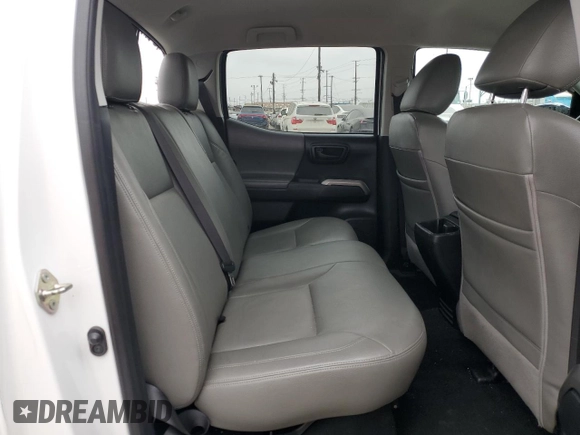 2017 Toyota Tacoma SR5 z VIN 3TMAZ5CN8HM040978, wystawiony jako Copart lot #58813575 z przebiegiem 103 730 mil mil oraz Nie do naprawy • Non repairable. Historia ofert i sprzedaży dostępna na DreamBid. Obrazek 10.
