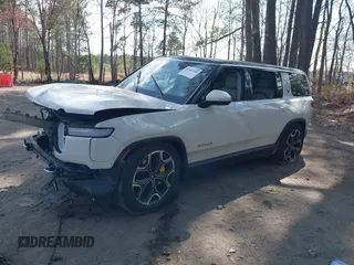 2023 Rivian R1S Launch Edition with VIN 7PDSGABL5PN006609, listed as a IAAI auction lot 41903200 with Not Provided miles. Bid and sale history available at carsss.com. Image 2.