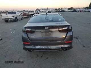 2015 Kia Optima LX with VIN 5XXGM4A72FG469281, listed as a Copart auction lot 83656144 with 129,491 mi miles and Salvage Title. Bid and sale history available at DreamBid. Image 6.