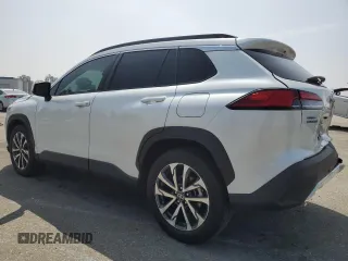 2023 Toyota Corolla Cross XLE with VIN 7MUDAAAG2PV042957, listed as a Copart auction lot 60301555 with 39,211 mi miles and Salvage title. Bid and sale history available at DreamBid. Image 2.