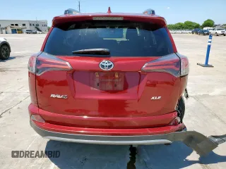 2018 Toyota RAV4 XLE with VIN 2T3WFREV0JW489613, listed as a Copart auction lot 61245005 with 46,253 mi miles and Salvage title. Bid and sale history available at DreamBid. Image 6.