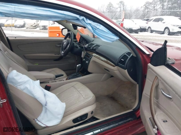 2012 BMW 1 Series 128i with VIN WBAUP7C52CVP23950, listed as a IAAI auction lot 41557941 with 99,430 mi miles. Bid and sale history available at carsss.com. Image 5.