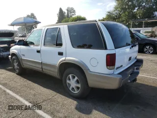 2000 Oldsmobile Bravada z VIN 1GHDT13W7Y2351268, wystawiony jako Copart lot #66408824 z przebiegiem 134 512 mil mil oraz Tytuł czysty. Historia ofert i sprzedaży dostępna na DreamBid. Obrazek 2.