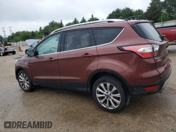 2018 Ford Escape Titanium z VIN 1FMCU0J93JUA70449, wystawiony jako Copart lot #59303245 z przebiegiem 165 907 mil mil oraz Szkoda całkowita • Salvage title. Historia ofert i sprzedaży dostępna na DreamBid. Obrazek 2.