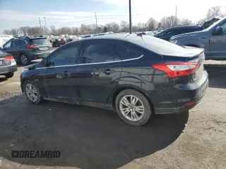2012 Ford Focus SEL with VIN 1FAHP3H20CL329098, listed as a Copart auction lot 46990485 with 131,783 mi miles and Salvage Title. Bid and sale history available at DreamBid. Image 2.