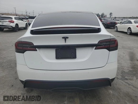 2023 Tesla Model X with VIN 7SAXCBE53PF380665, listed as a Copart auction lot 50799755 with Not Provided miles and Salvage Title. Bid and sale history available at DreamBid. Image 6.