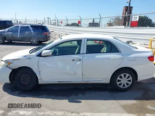 2010 Toyota Corolla with VIN 1NXBU4EE2AZ223753, listed as a IAAI auction lot 42024028 with 204,029 mi miles. Bid and sale history available at carsss.com. Image 14.
