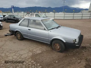 1987 Nissan Sentra z VIN JN1PB2210HU557007, wystawiony jako Copart lot #68174784 z przebiegiem 150 316 mil mil oraz Tytuł czysty. Historia ofert i sprzedaży dostępna na DreamBid. Obrazek 4.