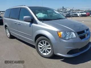 2014 Dodge Grand Caravan SXT z VIN 2C4RDGCG7ER140749, wystawiony jako IAAI lot #42244472 z przebiegiem 101 100 mil mil oraz . Historia ofert i sprzedaży dostępna na DreamBid. Obrazek 1.