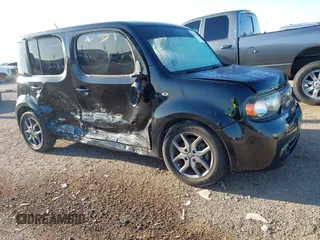 2009 Nissan Cube SL z VIN JN8AZ28R59T101303, wystawiony jako IAAI lot #42238702 z przebiegiem 100 581 mil mil oraz . Historia ofert i sprzedaży dostępna na DreamBid. Obrazek 1.