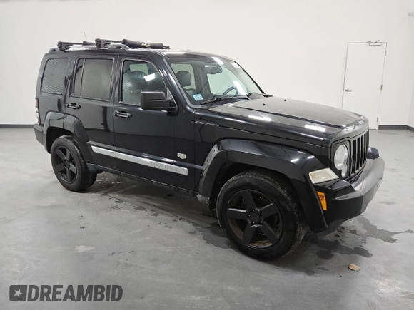 2011 Jeep Liberty Sport 70th Anniversary with VIN 1J4PN2GK5BW558133, listed as a Copart auction lot 52900925 with 119,803 mi miles and Clean Title. Bid and sale history available at DreamBid. Image 4.