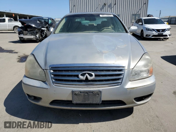 2006 Infiniti Q45 z VIN JNKBF01A46M800170, wystawiony jako Copart lot #57114275 z przebiegiem 197 502 mil mil oraz Tytuł czysty. Historia ofert i sprzedaży dostępna na DreamBid. Obrazek 5.