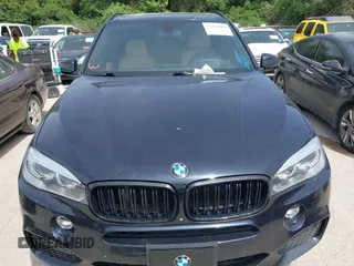 2014 BMW X5 xDrive50i with VIN 5UXKR6C55E0C03743, listed as a IAAI auction lot 42268302 with 118,892 mi miles and . Bid and sale history available at DreamBid. Image 12.