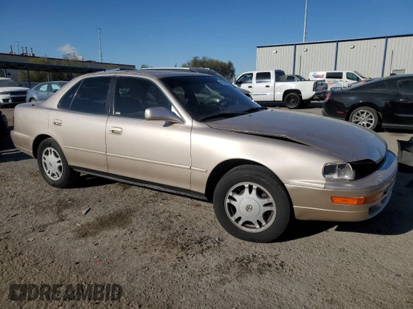 1994 Toyota Camry XLE with VIN JT2GK13E0R0017831, listed as a Copart auction lot 49887485 with 143,303 mi miles and Salvage Title. Bid and sale history available at carsss.com. Image 4.