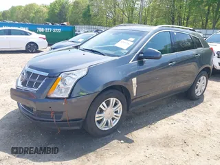 2012 Cadillac SRX Luxury Collection with VIN 3GYFNAE36CS657803, listed as a IAAI auction lot 42016746 with 209,754 mi miles and . Bid and sale history available at carsss.com. Image 2.