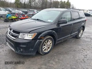 2013 Dodge Journey SXT with VIN 3C4PDDBG2DT507690, listed as a IAAI auction lot 41793988 with 211,110 mi miles and . Bid and sale history available at DreamBid. Image 2.