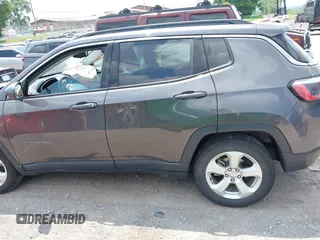 2019 Jeep Compass Latitude with VIN 3C4NJCBB1KT833007, listed as a IAAI auction lot 42401265 with 106,973 mi miles and . Bid and sale history available at DreamBid. Image 14.