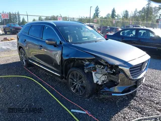 2016 Mazda CX-9 Signature with VIN JM3TCBEY7G0102377, listed as a IAAI auction lot 42384006 with 105,591 mi miles and . Bid and sale history available at DreamBid. Image 1.
