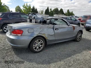 2009 BMW 1 Series 128i with VIN WBAUL73509VJ76763, listed as a Copart auction lot 66763214 with 83,954 mi miles and Salvage Title. Bid and sale history available at DreamBid. Image 3.