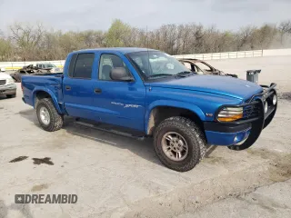 2000 Dodge Dakota Sport with VIN 1B7GG2AN0YS699193, listed as a Copart auction lot 51438325 with 127,106 mi miles and Salvage Title. Bid and sale history available at carsss.com. Image 4.