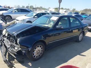 2001 Mercedes-Benz E-Class with VIN WDBJF65J11B368277, listed as a IAAI auction lot 41855716 with 207,864 mi miles. Bid and sale history available at carsss.com. Image 17.