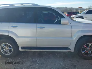 2009 Lexus GX 470 z VIN JTJBT20X390175930, wystawiony jako IAAI lot #41856945 z przebiegiem 207 809 mil mil oraz . Historia ofert i sprzedaży dostępna na DreamBid. Obrazek 13.