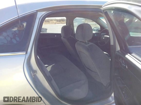 2008 Chevrolet Impala with VIN 2G1WS583X81235160, listed as a IAAI auction lot 41572405 with 158,822 mi miles and . Bid and sale history available at DreamBid. Image 8.