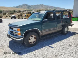 1997 Chevrolet Tahoe z VIN 1GNEK13R0VJ437621, wystawiony jako Copart lot #52763335 z przebiegiem 147 522 mil mil oraz Szkoda całkowita • Salvage title. Historia ofert i sprzedaży dostępna na DreamBid. Obrazek 1.