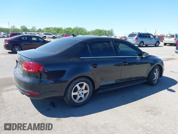 2014 Volkswagen Jetta GLI with VIN 3VW4T7AJ5EM382195, listed as a IAAI auction lot 39211126 with 94,735 mi miles and . Bid and sale history available at DreamBid. Image 4.