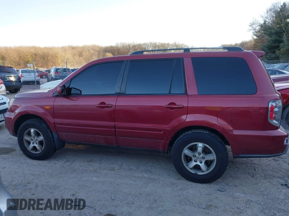 2006 Honda Pilot EX-L with VIN 5FNYF28586B005602, listed as a IAAI auction lot 41247326 with 221,698 mi miles and . Bid and sale history available at DreamBid. Image 14.