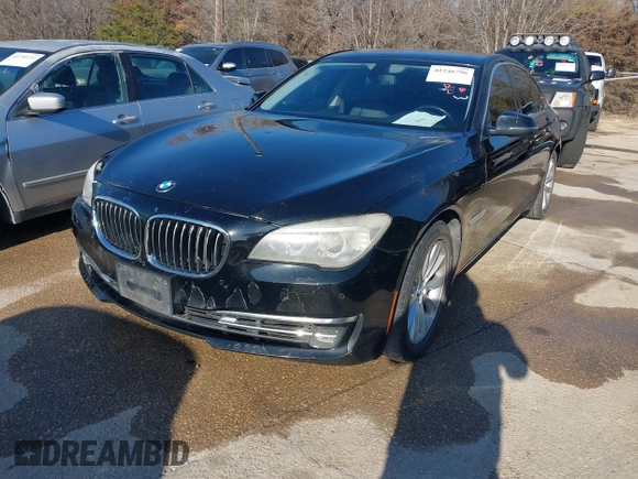 2013 BMW 7 Series 740i with VIN WBAYA6C55DC995094, listed as a IAAI auction lot 41246796 with 164,394 mi miles. Bid and sale history available at carsss.com. Image 2.