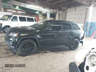 2015 Jeep Grand Cherokee Limited with VIN 1C4RJFBG4FC611156, listed as a IAAI auction lot 42021705 with 137,887 mi miles. Bid and sale history available at carsss.com. Image 14.