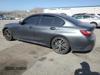 2020 BMW 3 Series 330i z VIN 3MW5R1J00L8B13518, wystawiony jako Copart lot #56289265 z przebiegiem 74 336 mil mil oraz Czysty tytuł • Clean title. Historia ofert i sprzedaży dostępna na DreamBid. Obrazek 2.