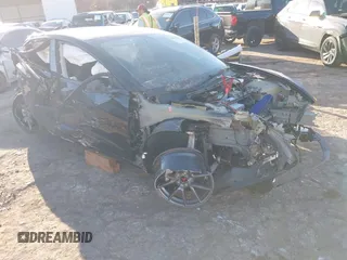 2023 Tesla Model 3 z VIN 5YJ3E1EA3PF641256, wystawiony jako IAAI lot #41626795 z przebiegiem 13 334 mil mil oraz . Historia ofert i sprzedaży dostępna na DreamBid. Obrazek 1.